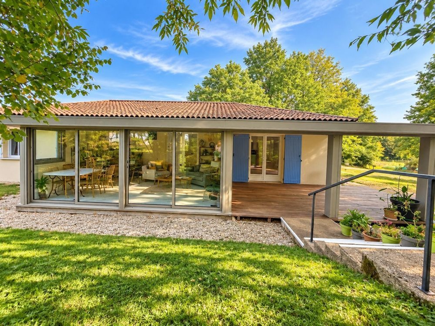 Maison de plain-pied 127 m² avec véranda et Jardin