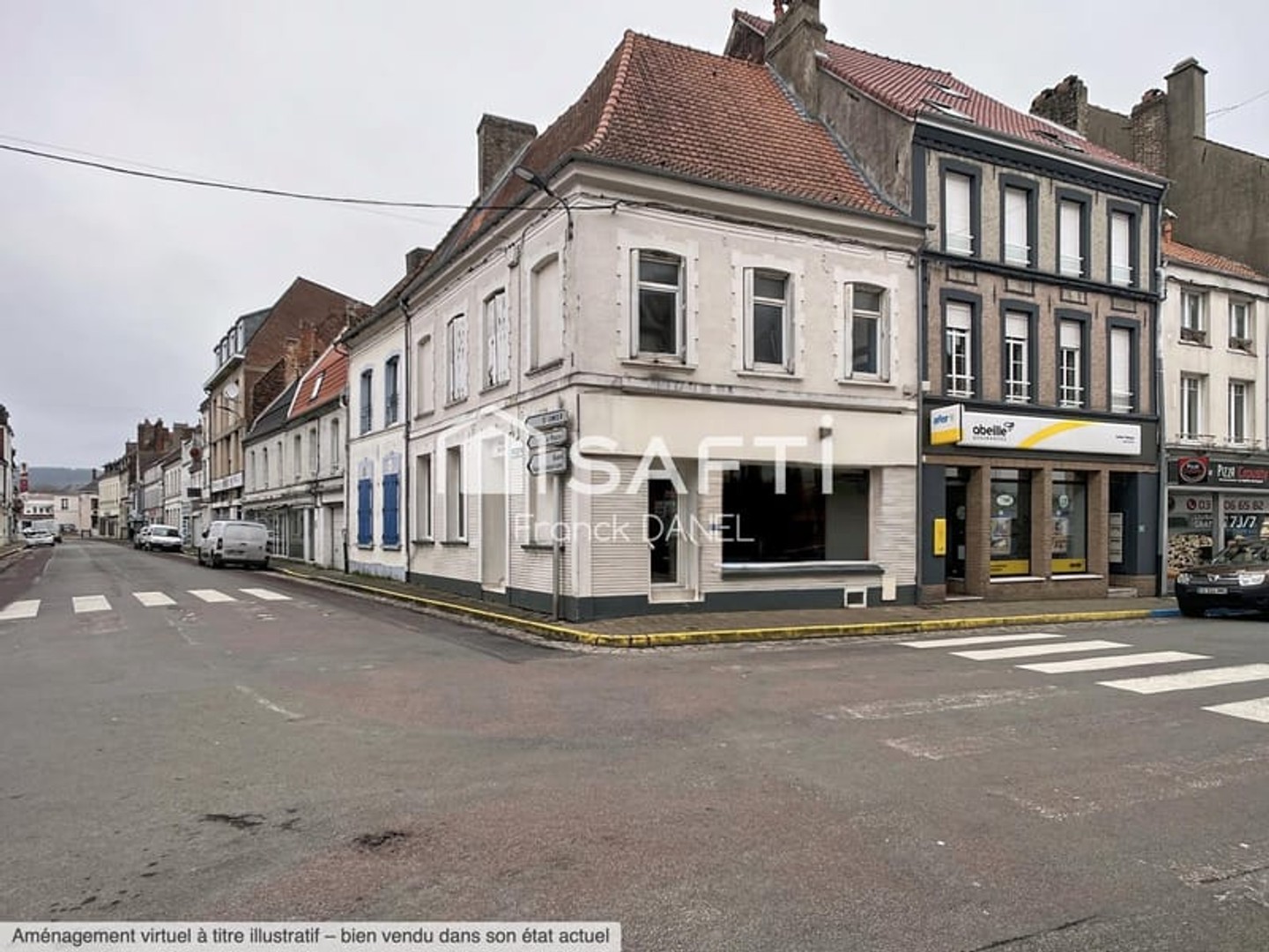 Immeuble composé d'un local commercial et un appartement à Hesdin
