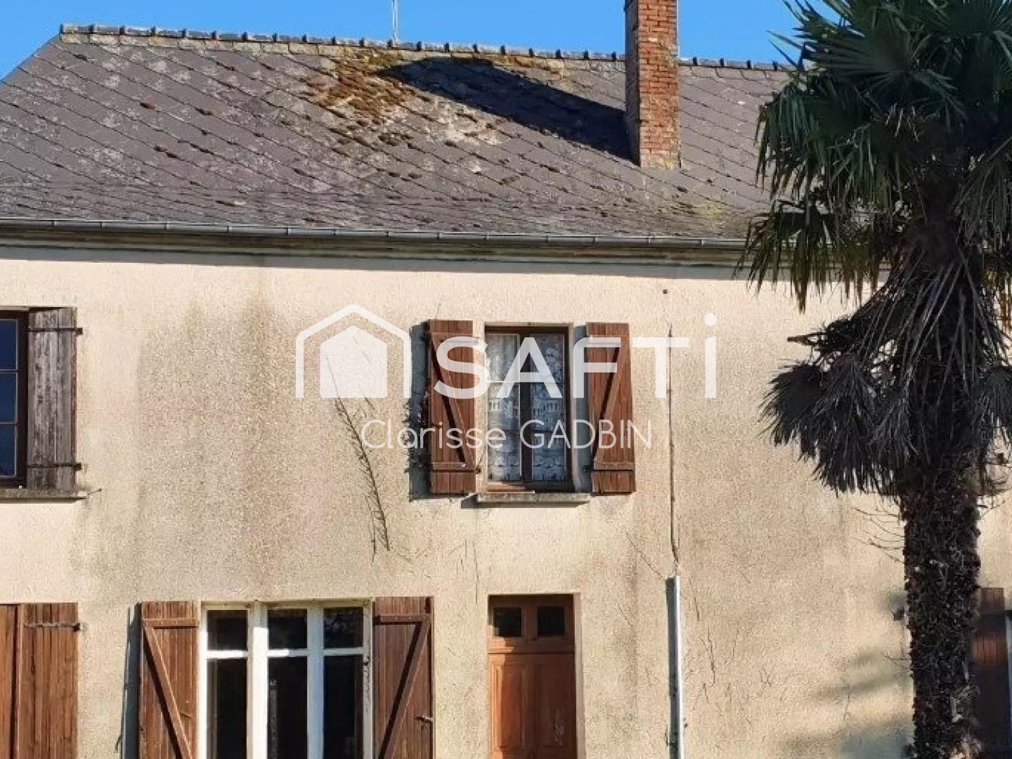 Maison de maître à rénover avec 8000 m² de terrain avec une partie constructible