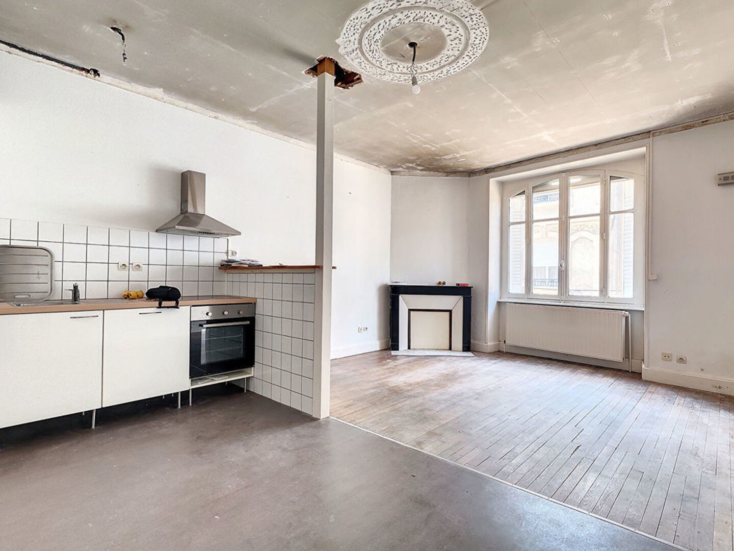 DEUX APPARTEMENTS AU REZ-DE-CHAUSSEE - A RENOVER
