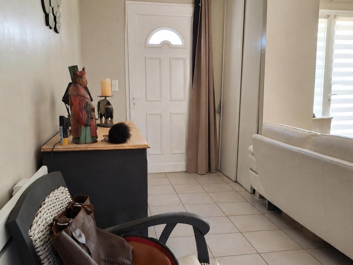 Au calme d'une impasse, découvrez cette agréable maison