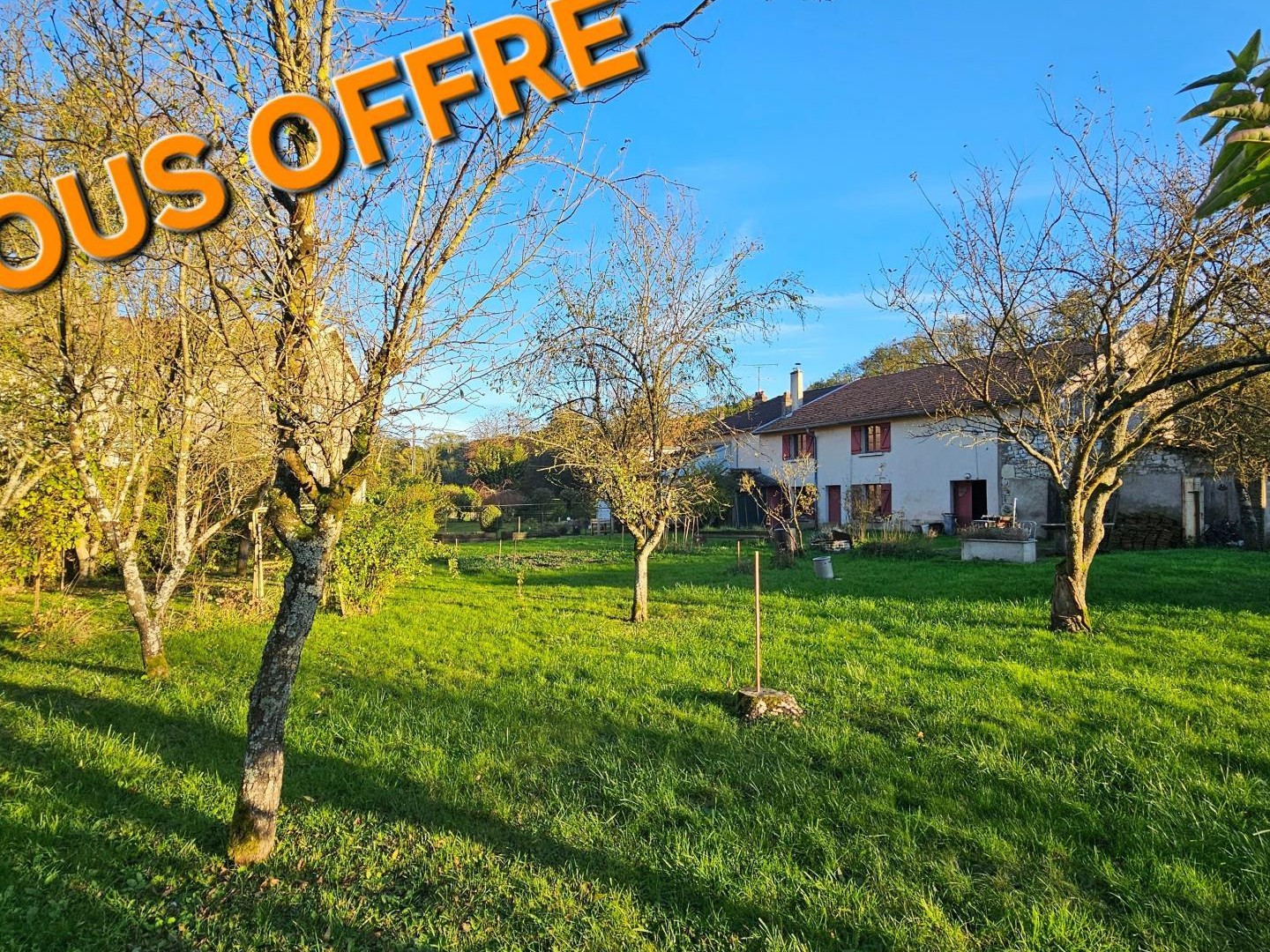 Maison à conforter avec jardin et grange.