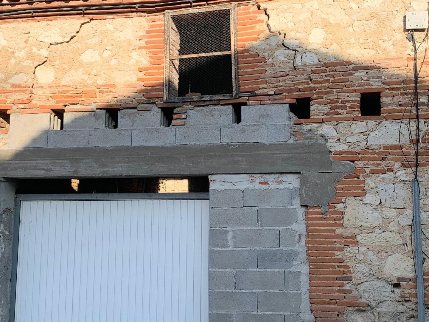 garage et terrain en zone urbaine