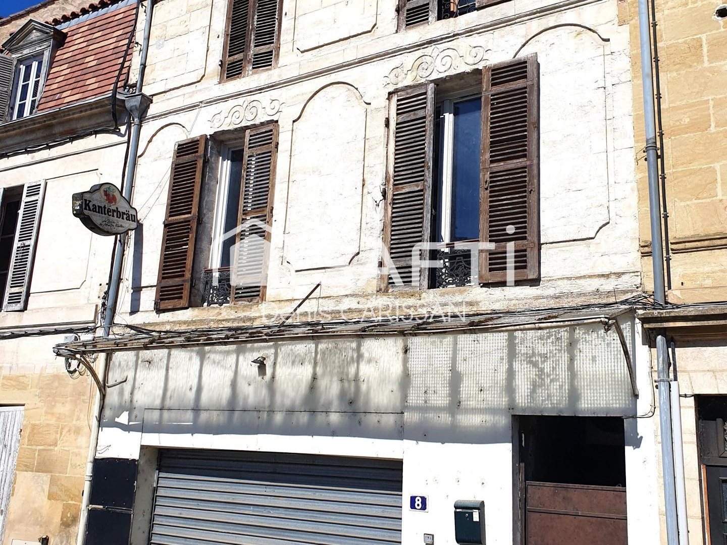 Immeuble local commercial + appartement T3