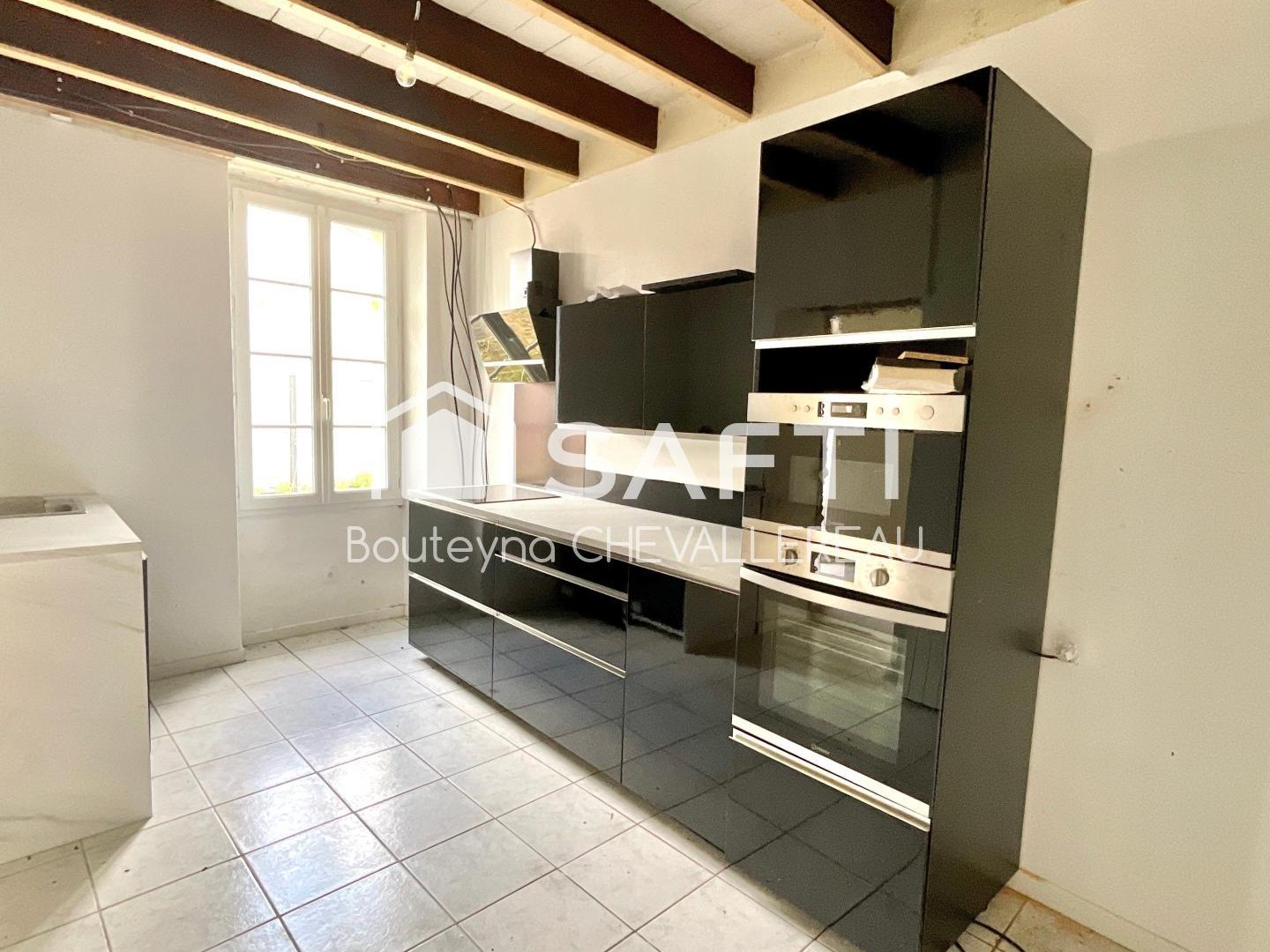 Maison à étage avec 2 chambres