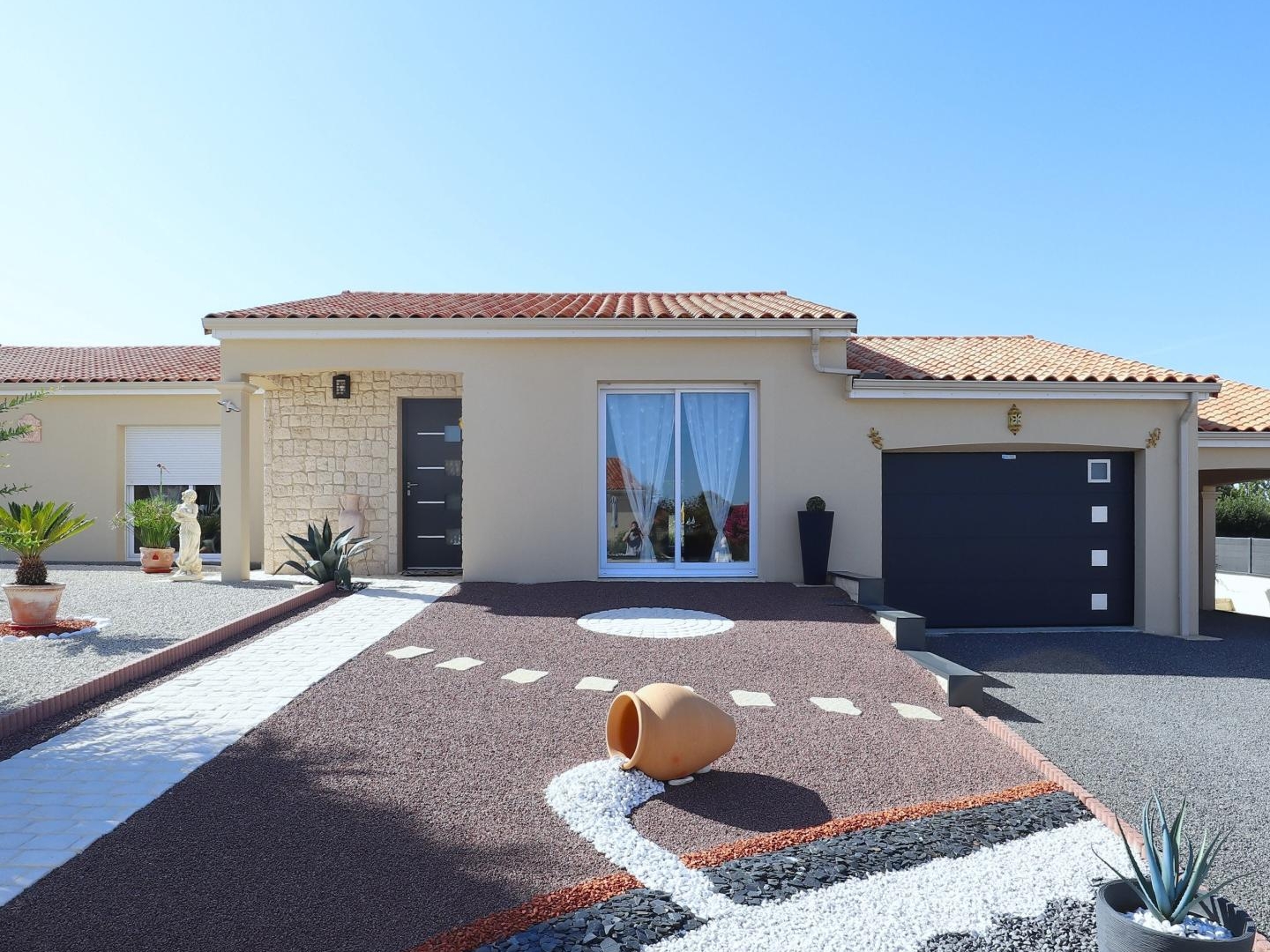 Superbe maison plain-pied 3 chambres avec garage et carport sur terrain de 1000m2