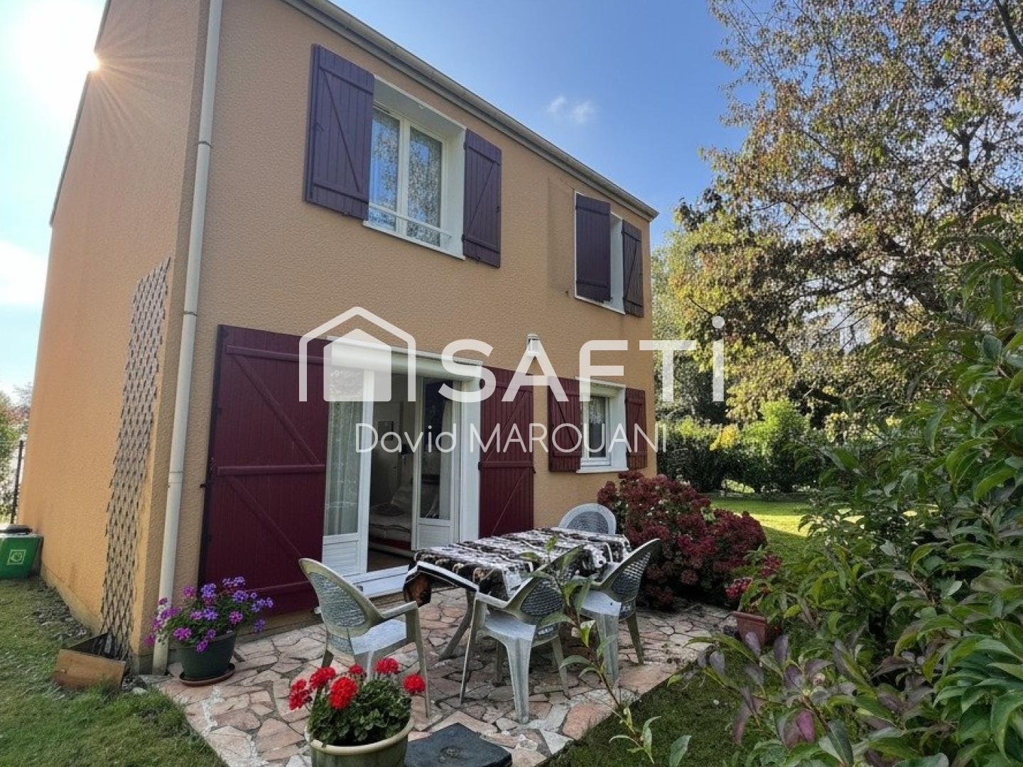 Maison familiale spacieuse avec jardin et garage