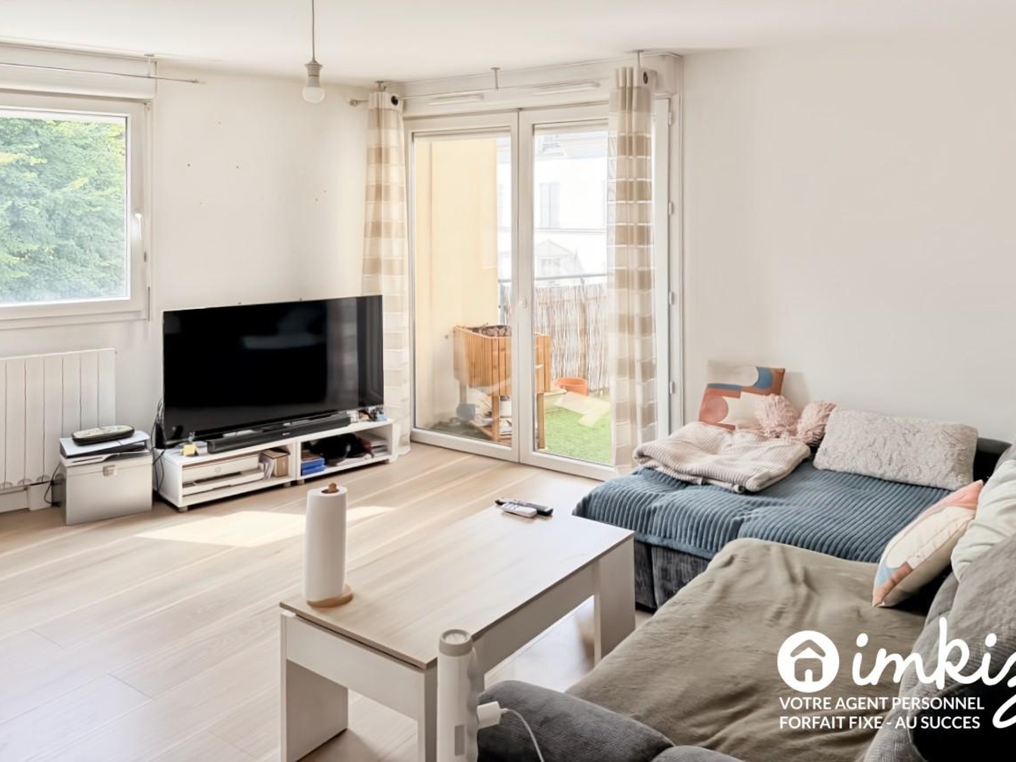 Appartement 3 pièces de 63m2, balcon, 2 parkings