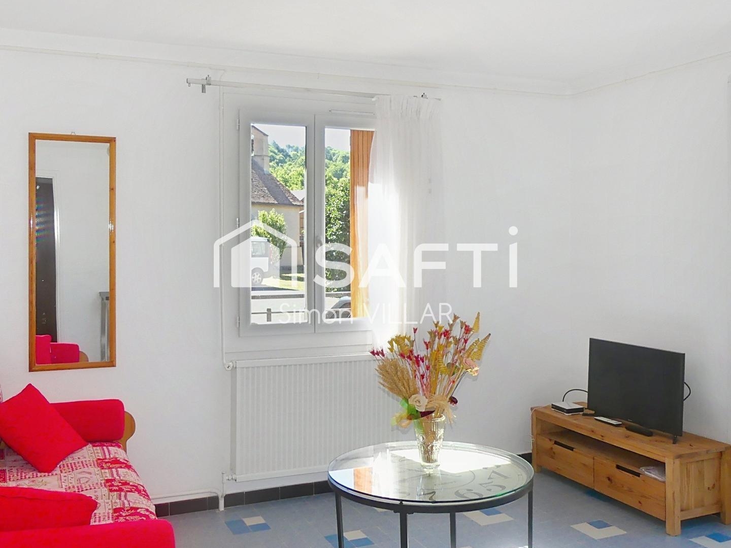Maison lumineuse et ensoleillée avec du potentiel