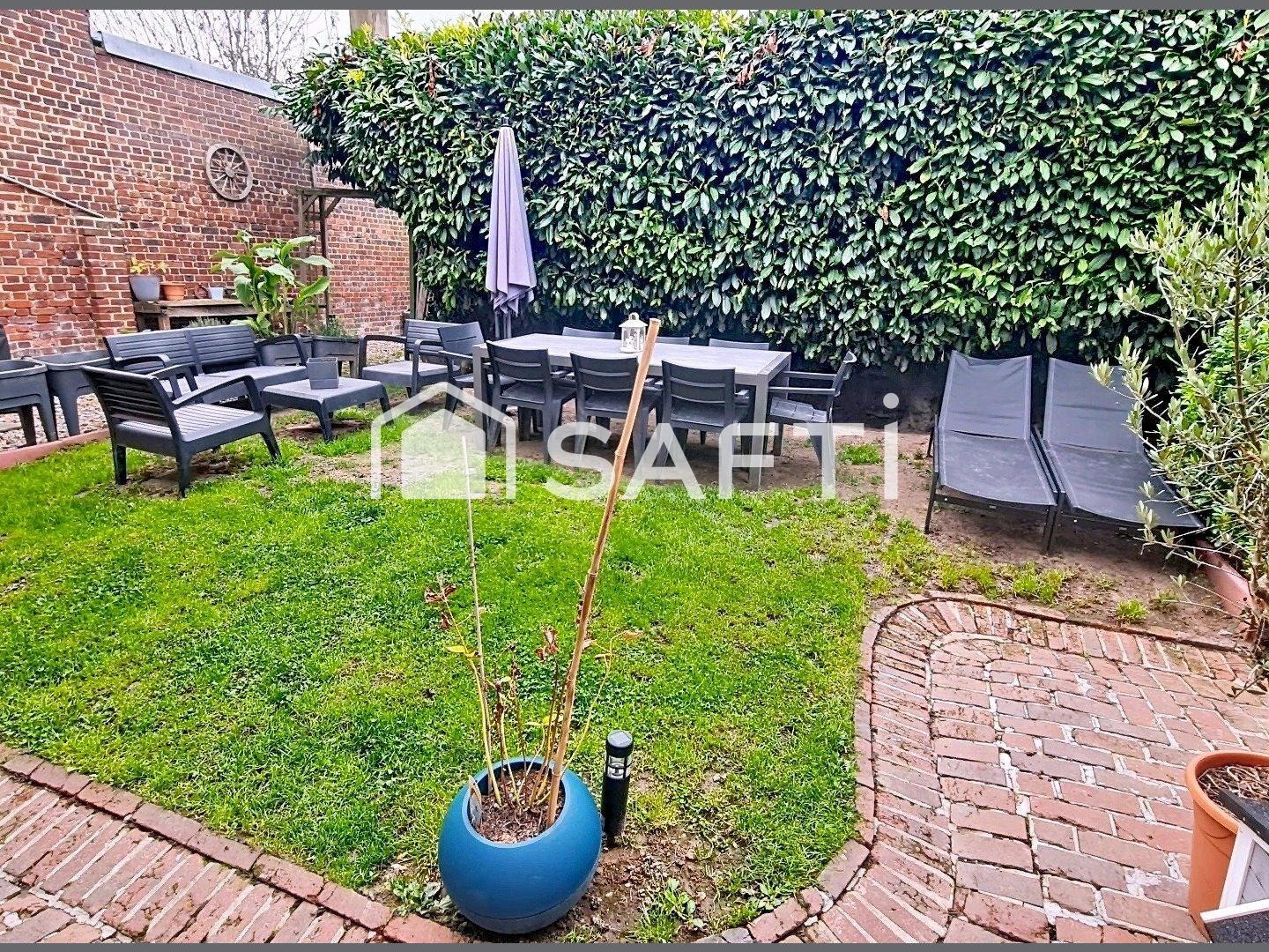 Maison de ville vivable de plain pied avec jardin