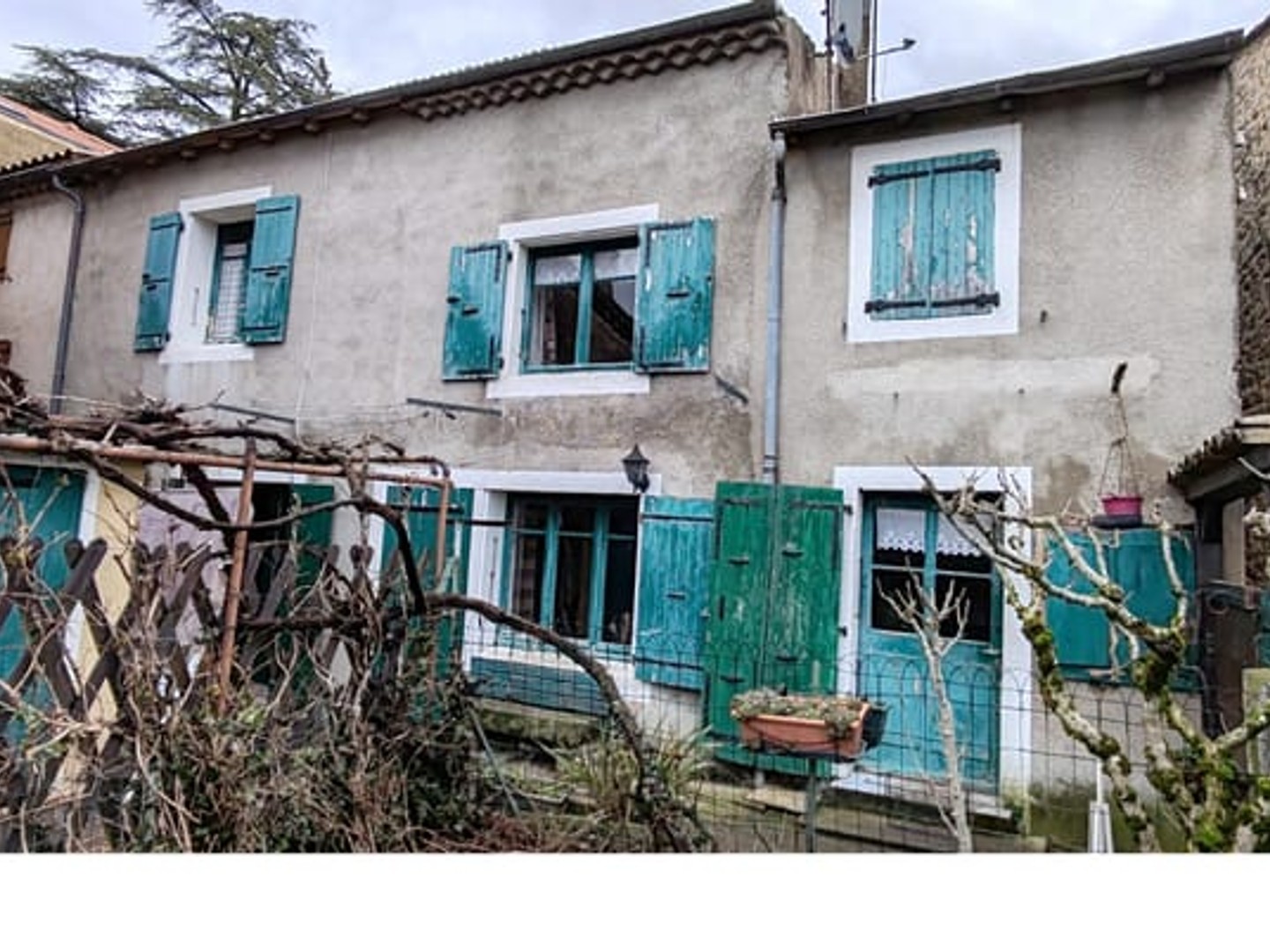 Maison divisée en 2 logements