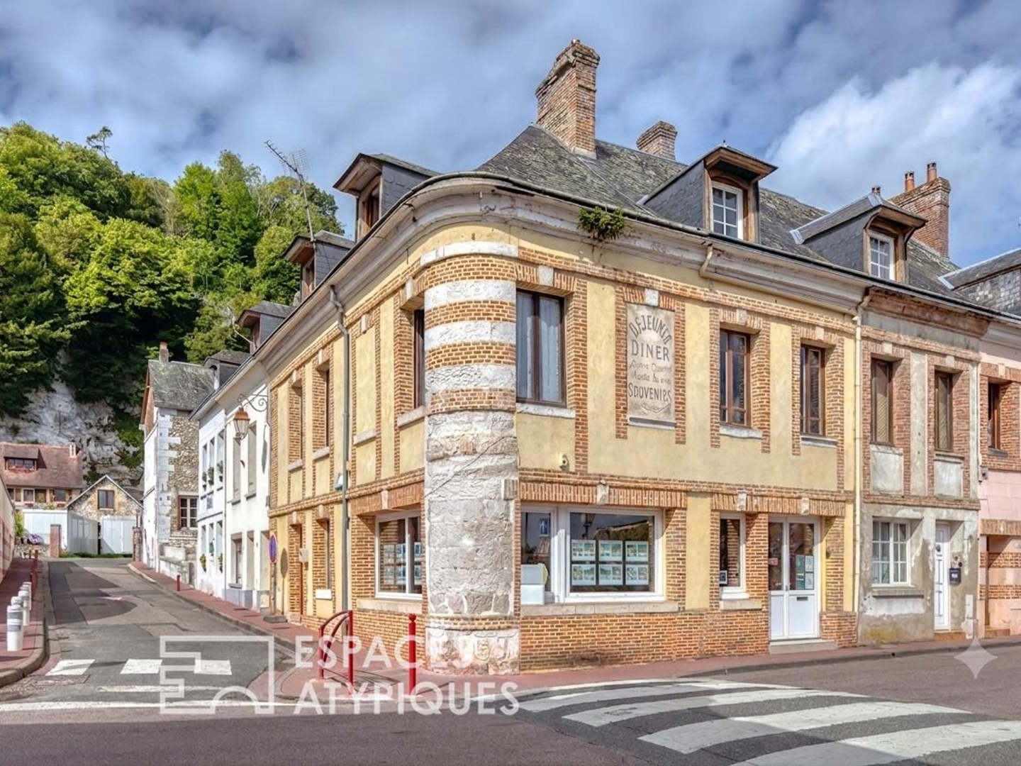 Immeuble loué composé d'un local commercial et appartement