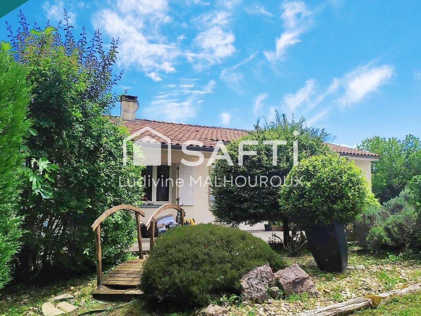 MAISON FAMILIALE 166 m² STUDIO 43 m² - TERRAIN 2 582 m² - GARAGE DOUBLE -