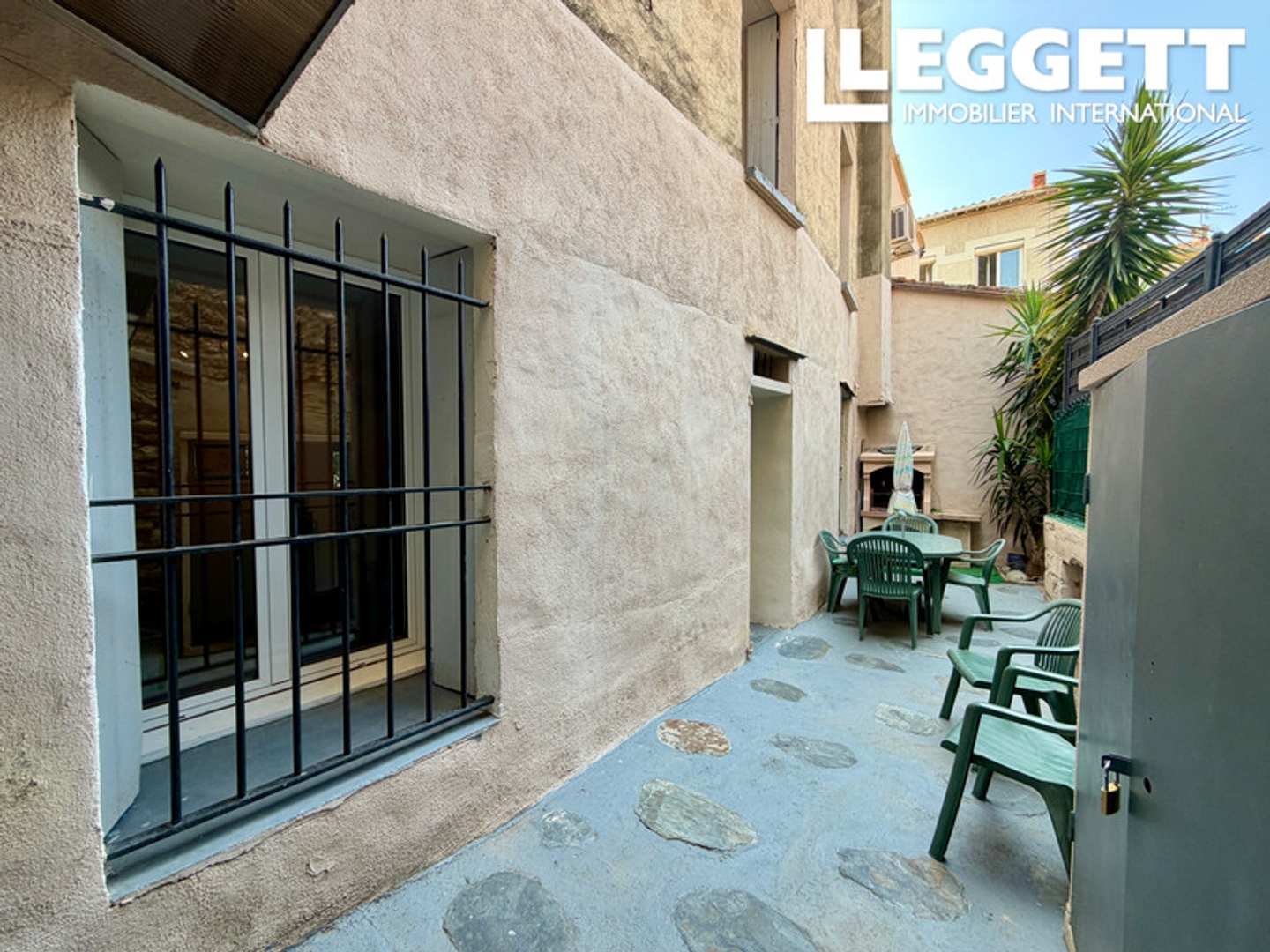 Élégante maison de village avec terrasse et local commercial