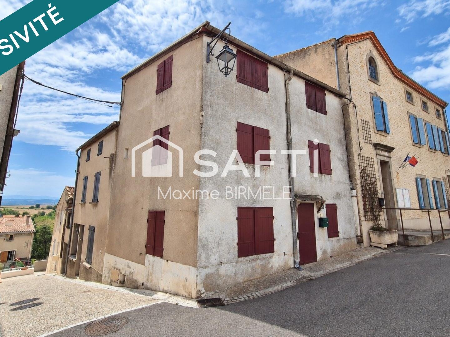 Ensemble immobilier : Maison + grange + terrain en zone constructible