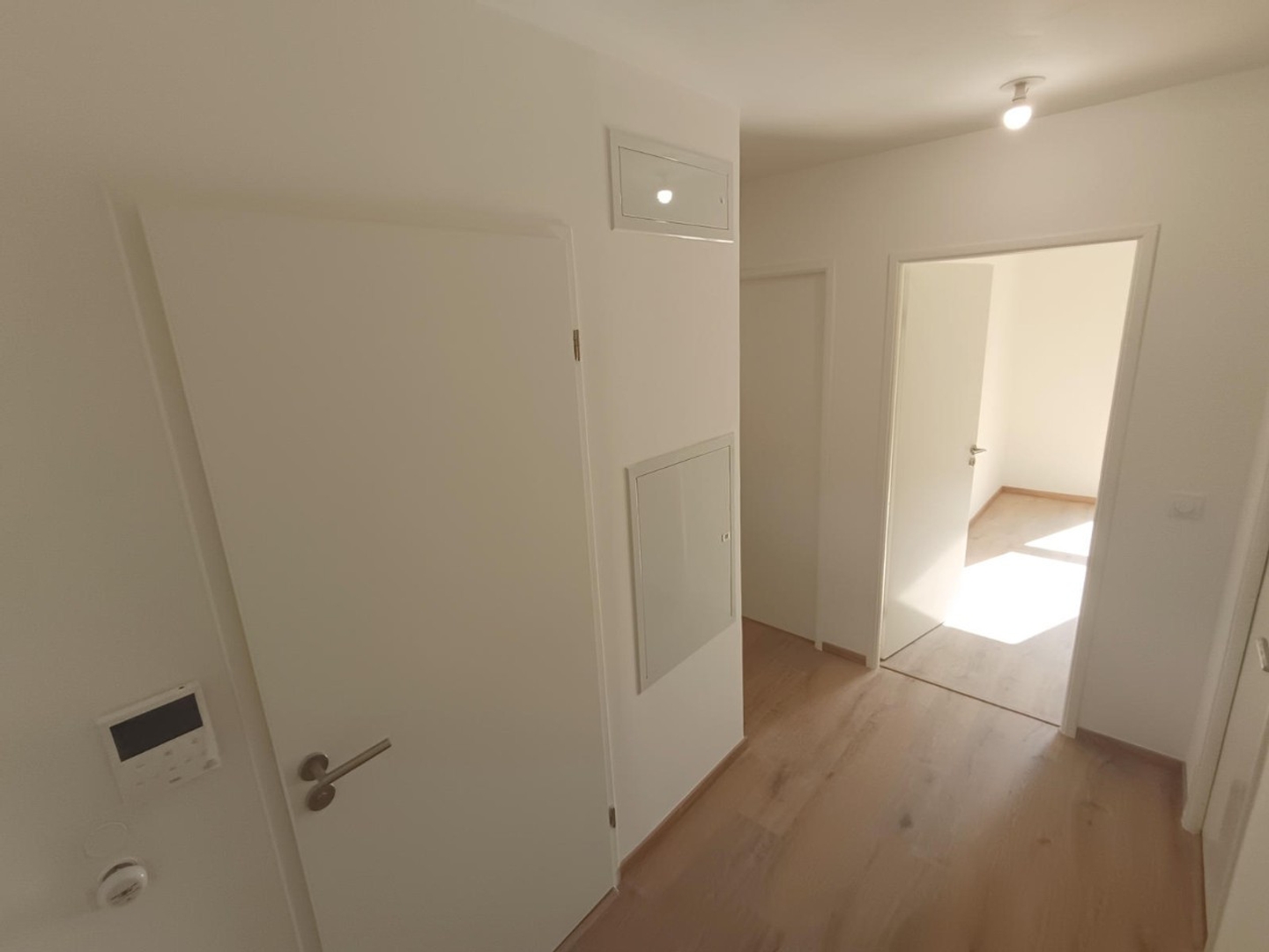 Appartement neuf, 2 chambres, balcon, parking