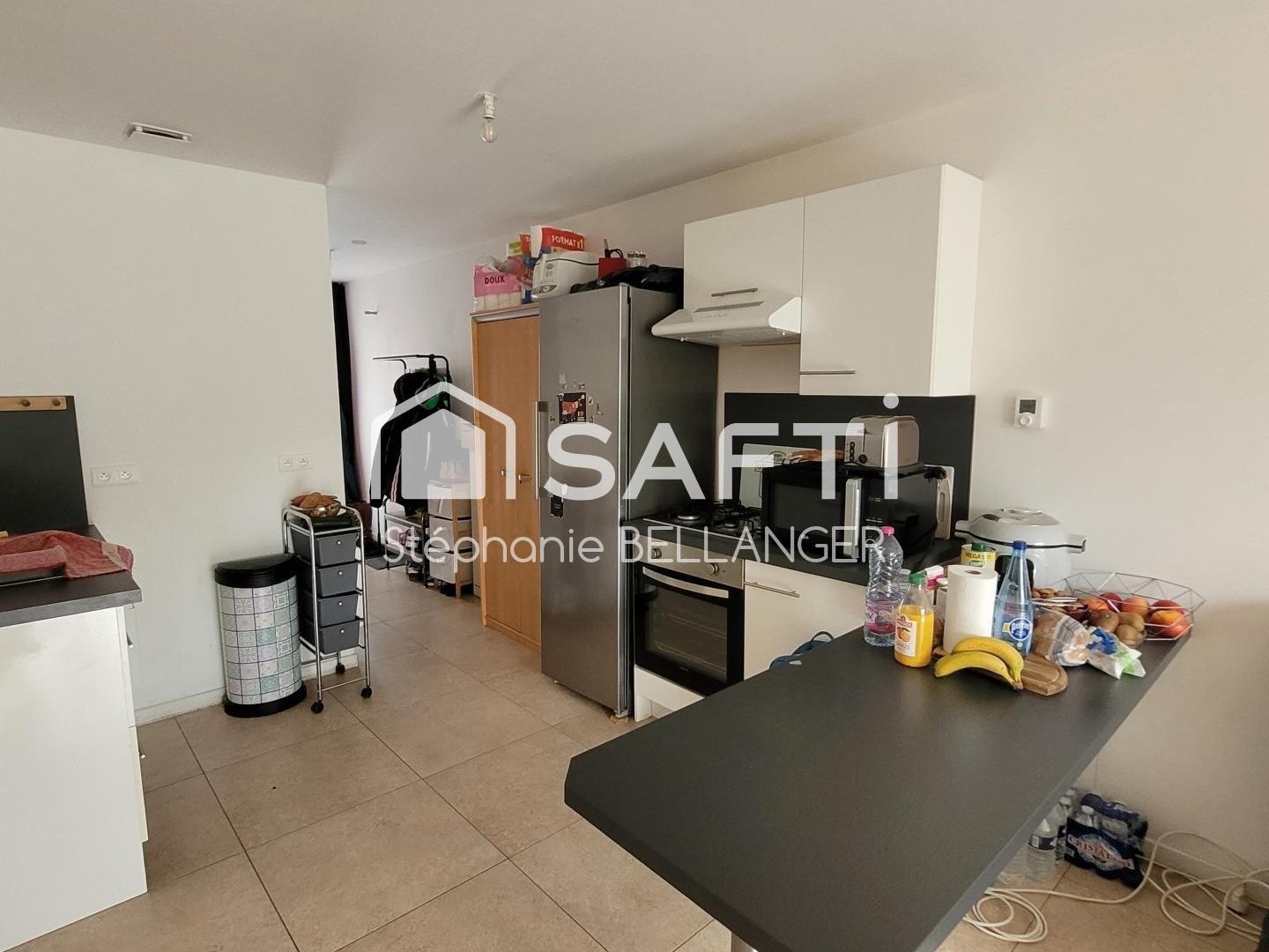 Immeuble 2 maisons 3 chambres chacunes, jardin, stationnement
