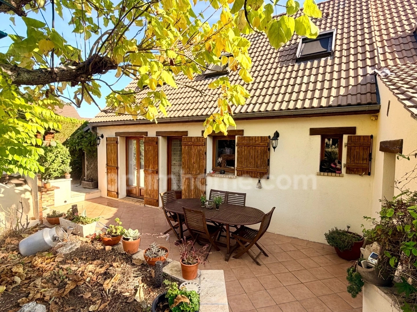 Maison 4 chambres + garage + beau jardin