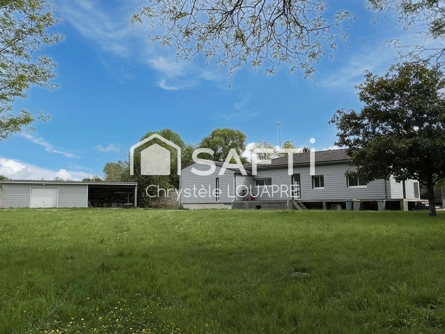 Maison de 5 pièces de 140 m² avec garage et atelier
