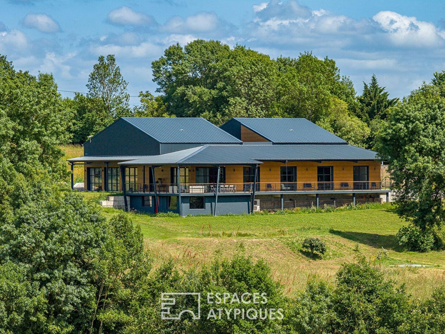 Oeuvre architecturale avec vue dominante sur la vallée