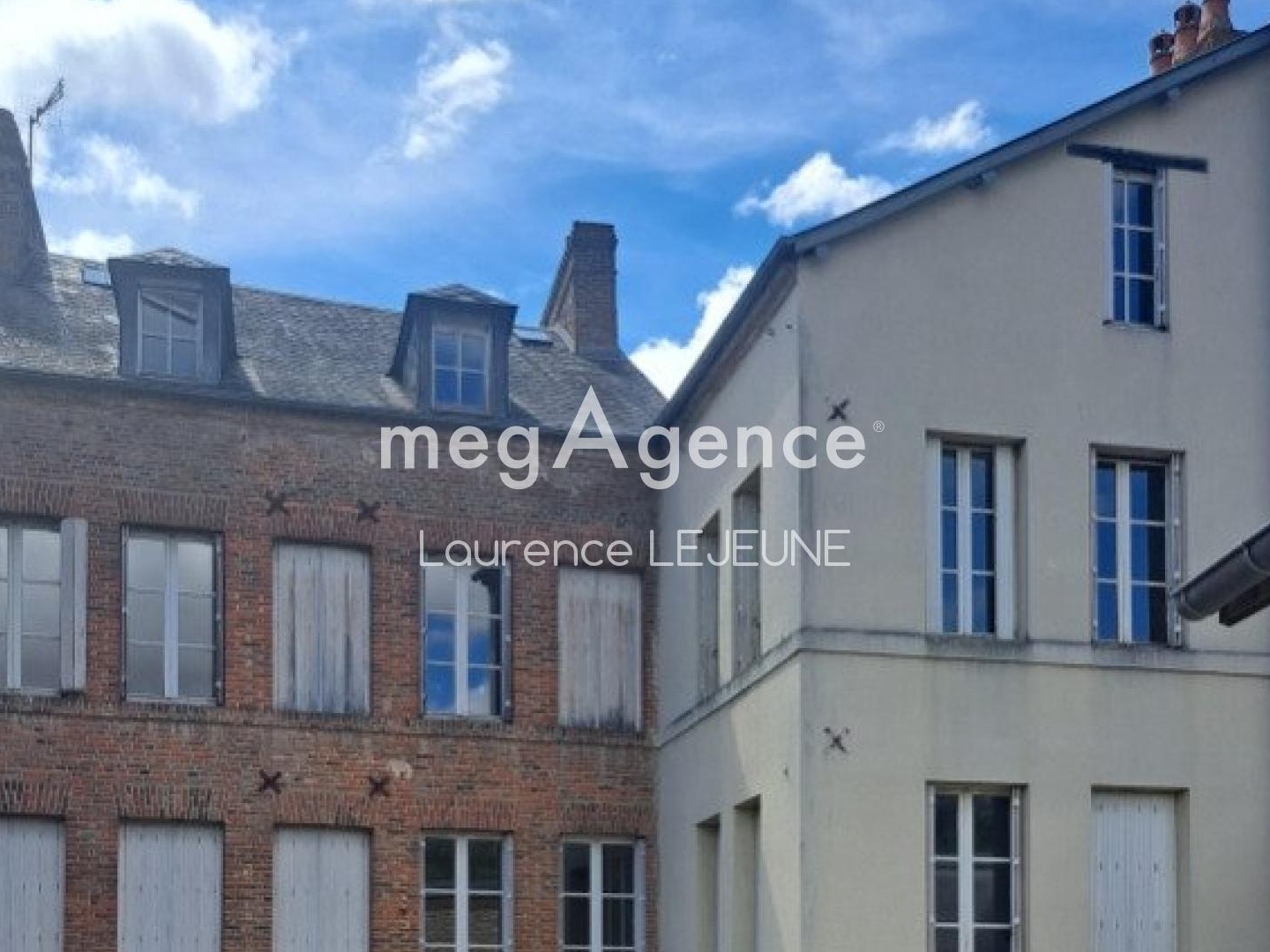 à ORBEC IMMEUBLE en monopropriété composé de 9 lots