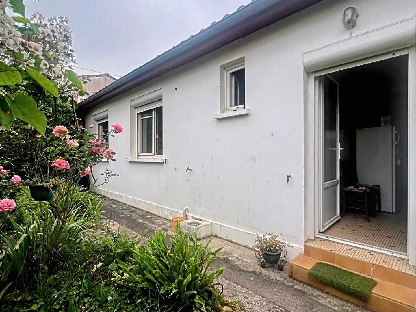 Maison plain-pied + jardin + garage