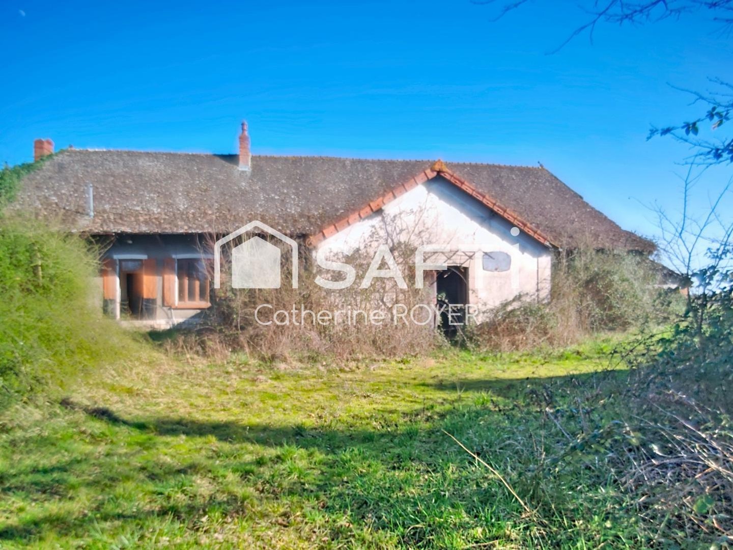 Maison à rénover entièrement sur grand terrain