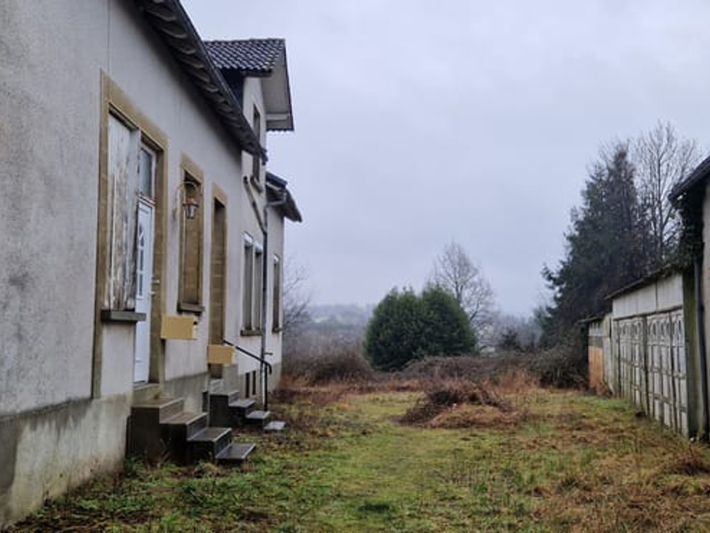 Immeuble locatif 4 logements + garages