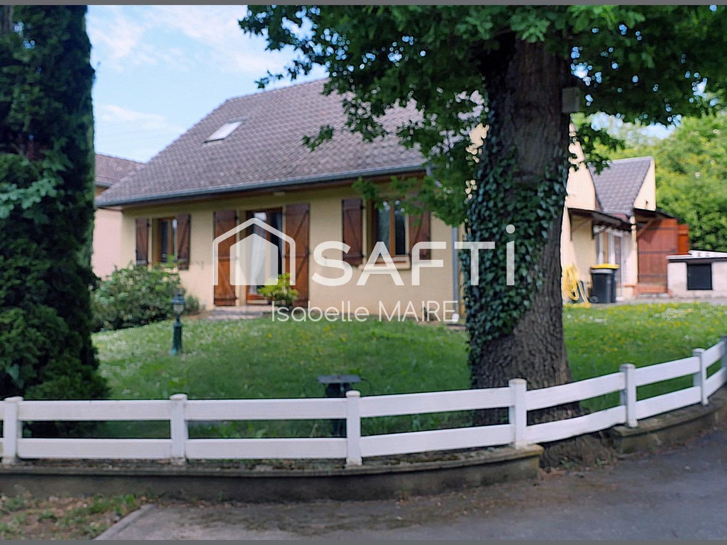 Maison individuelle avec véranda, garage et jardin