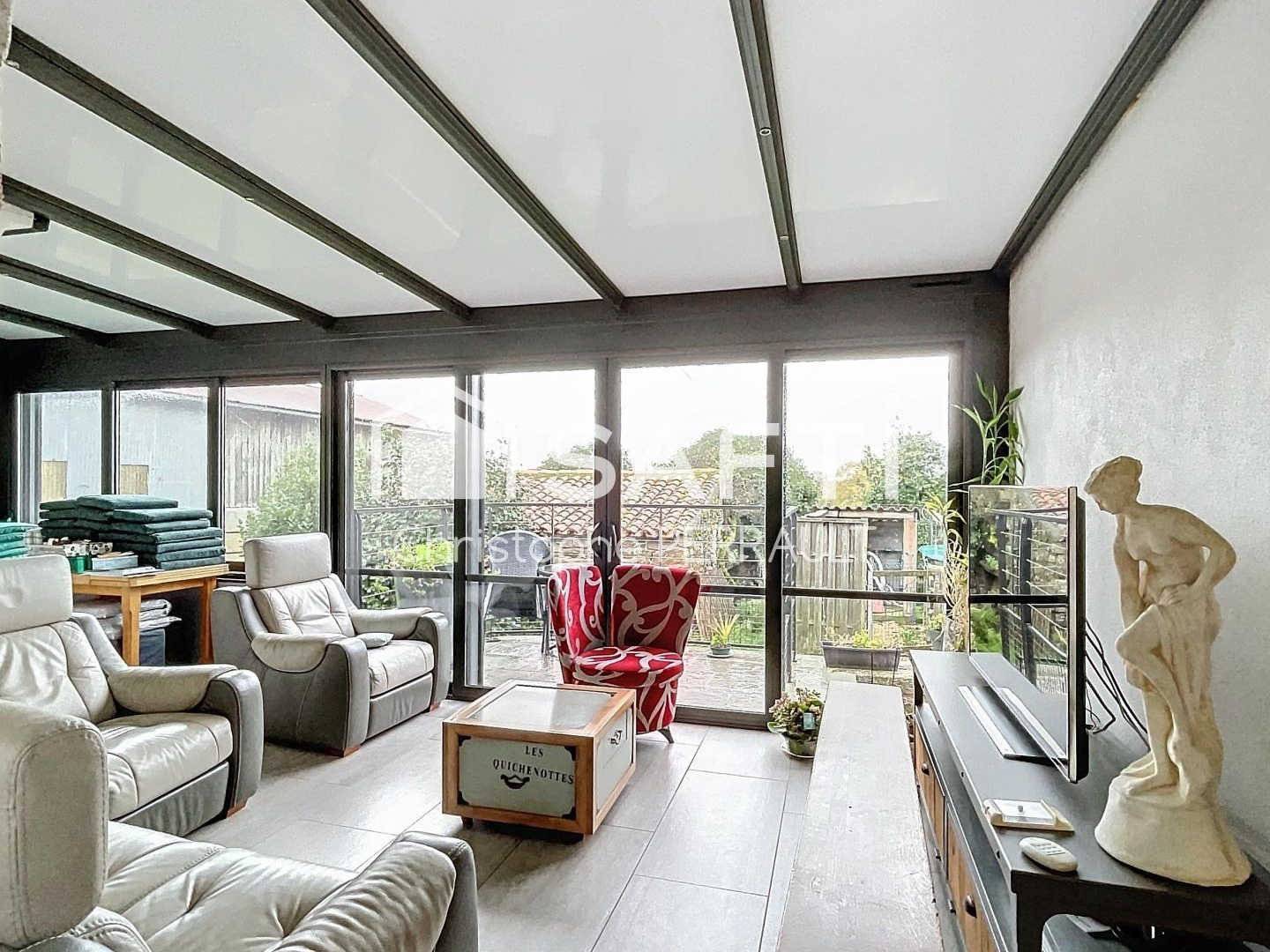 Propriété à la maison rénovée avec fort potentiel