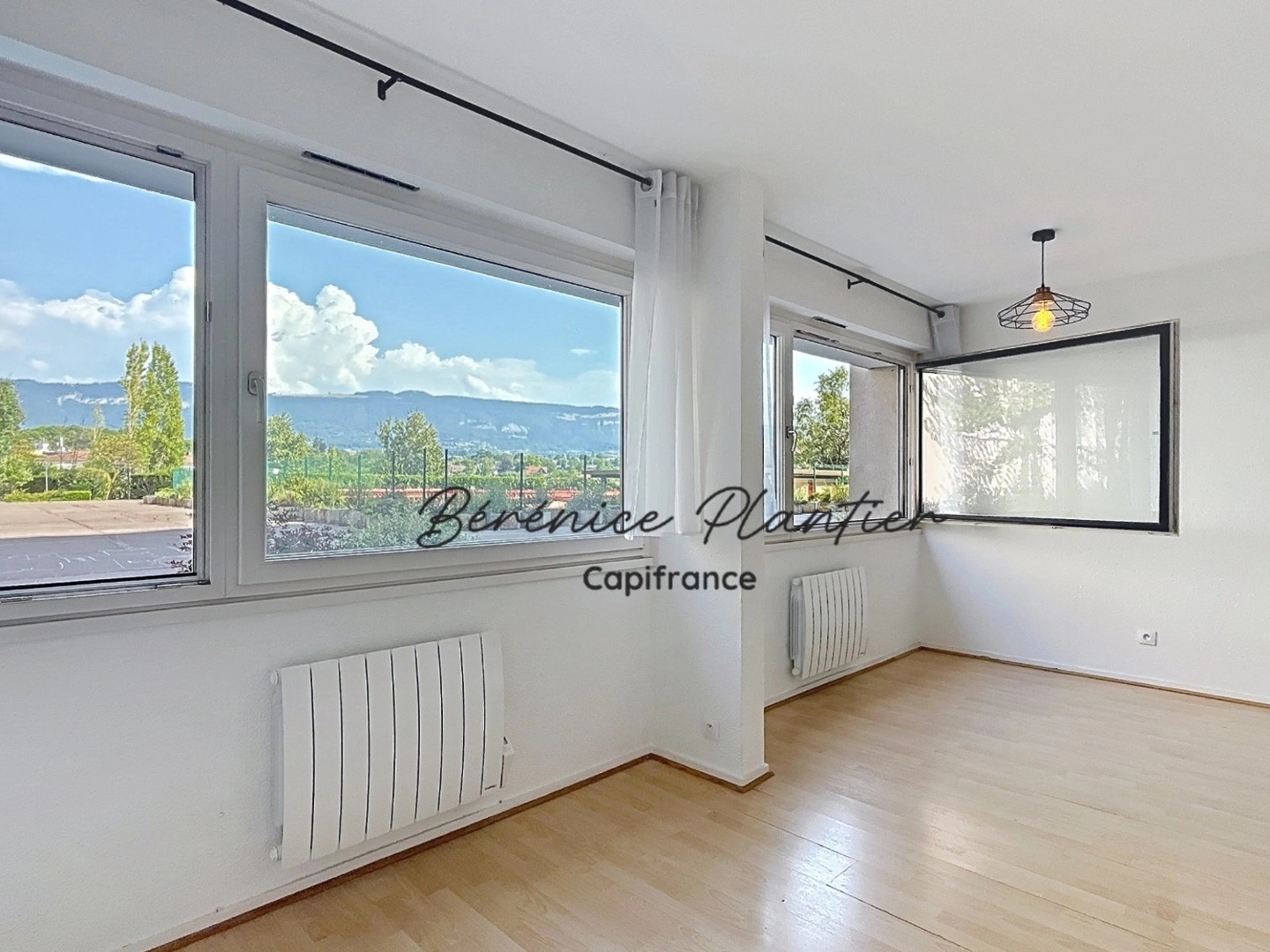 Appartement à vendre - 2 pièces - 50m2 - Saint-Julien-En-G... (74160)