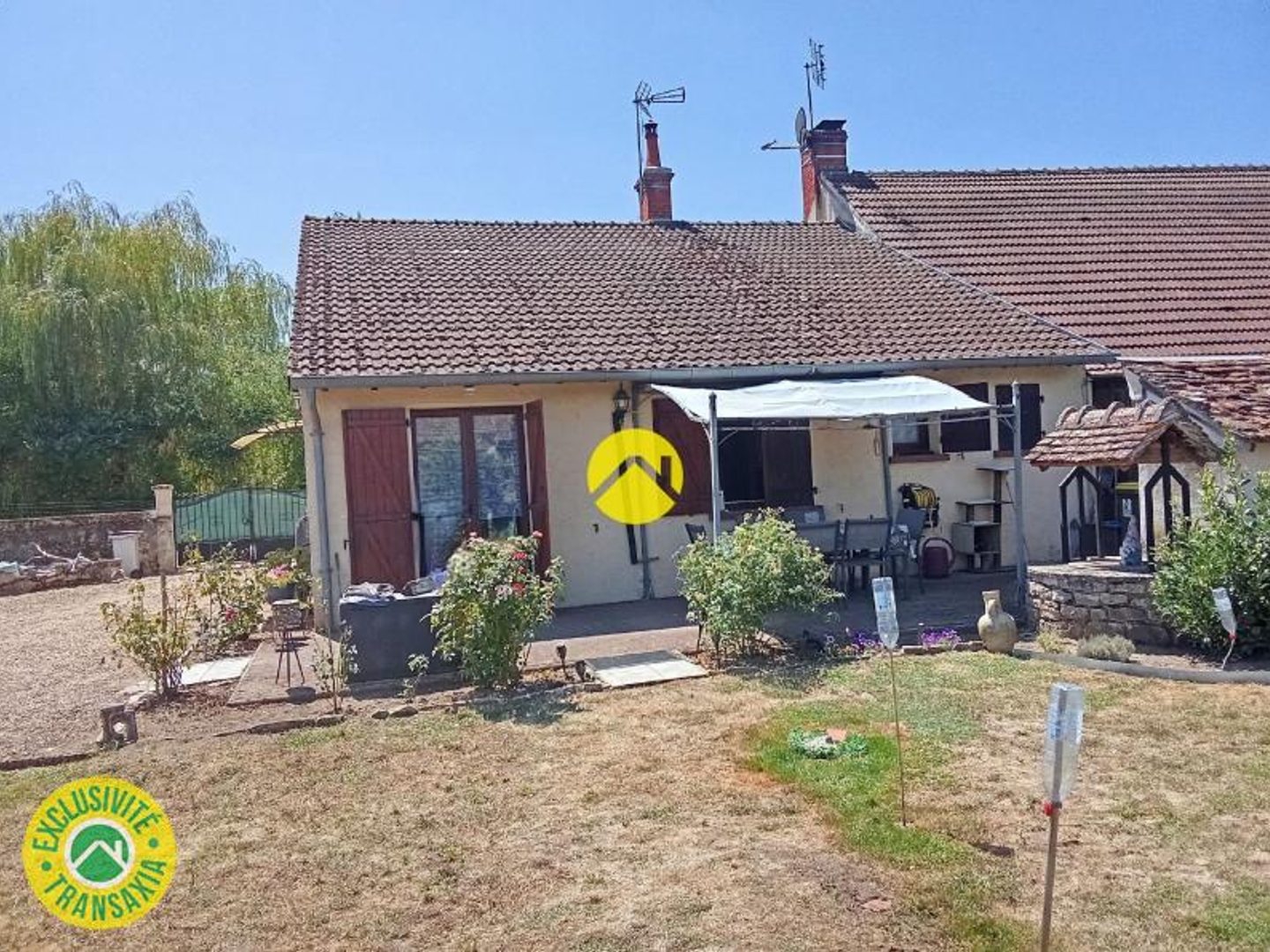 Maison mitoyenne d'un côté