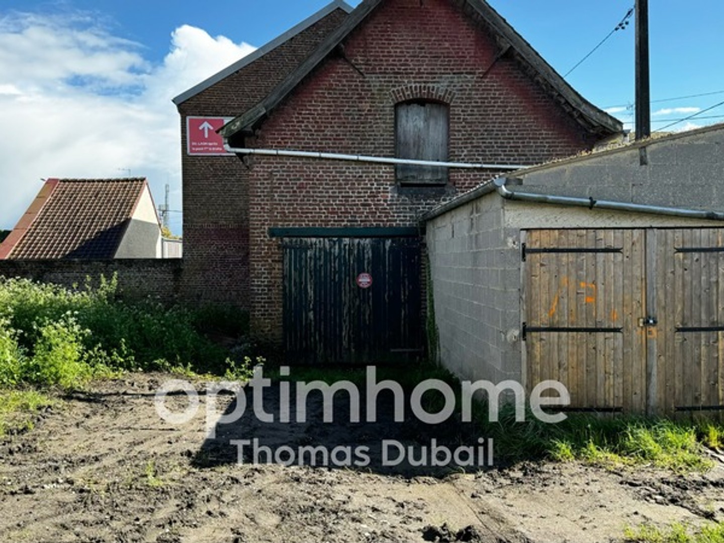 Garages et terrain constructible