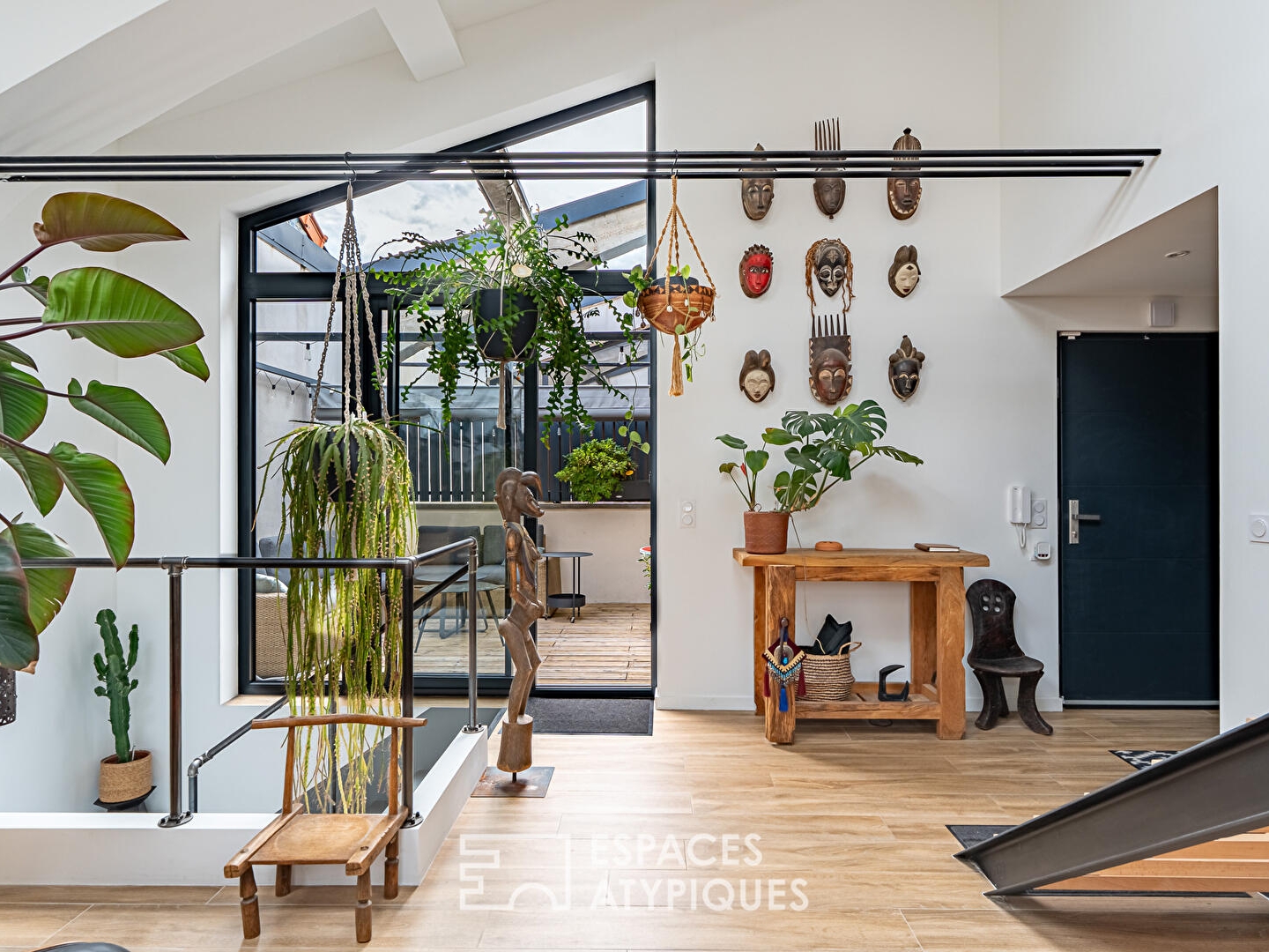 Loft en triplex avec terrasse et courette
